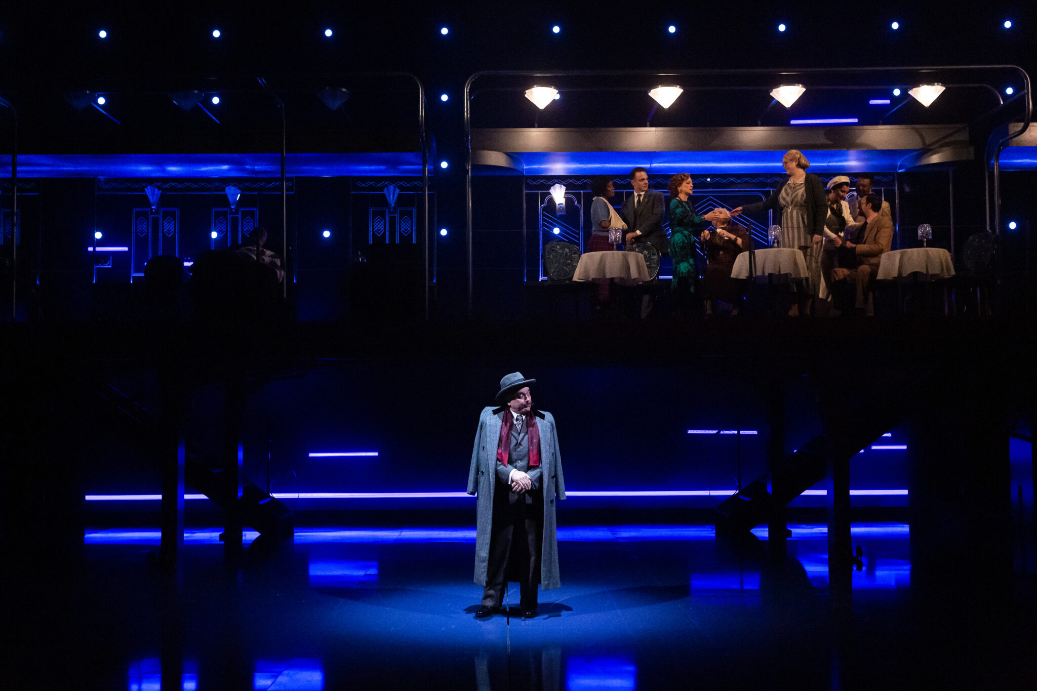 Shawn Hamilton as Monsieur Bouc, Melissa Molano as Countess Andrenyi, and David Sinaiko as Hercule Poirot in Agatha Christie’s Murder on the Orient Express.