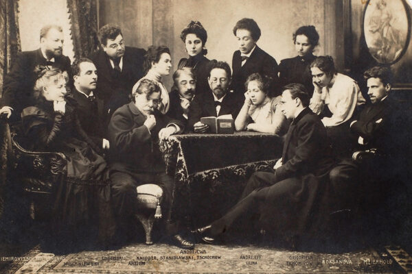 A posed photograph of Anton Chekhov reading his play The Seagull to the Moscow Art Theatre company_1898