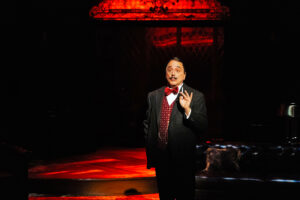 David Sinaiko as Hercule Poirot in Alley Theatre’s production of Agatha Christie’s The Murder of Roger Ackroyd