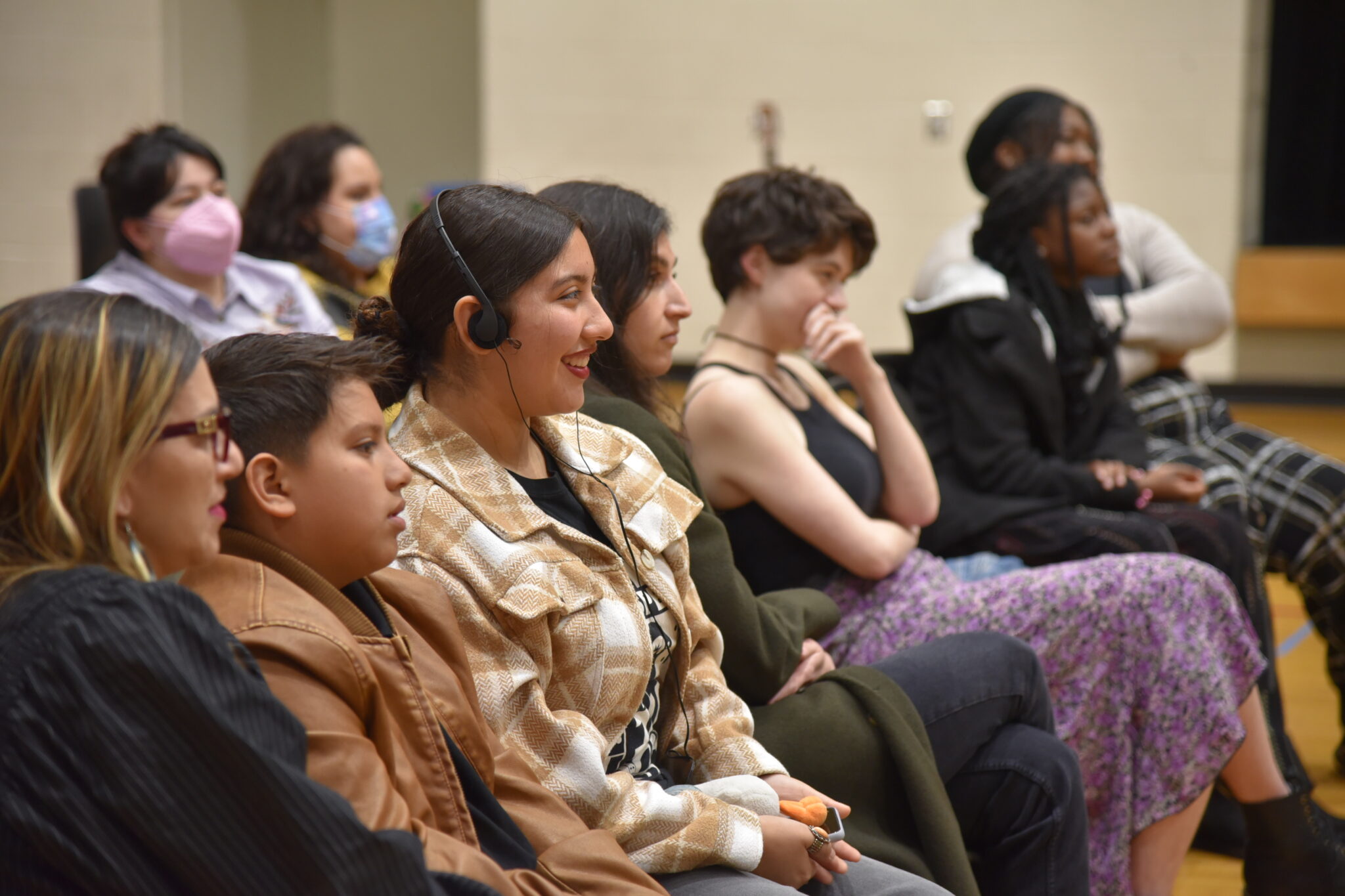 Audiences enjoying a production with simultaneous translations