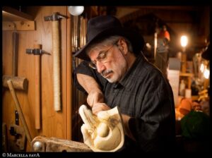 Antonio Fava making masks