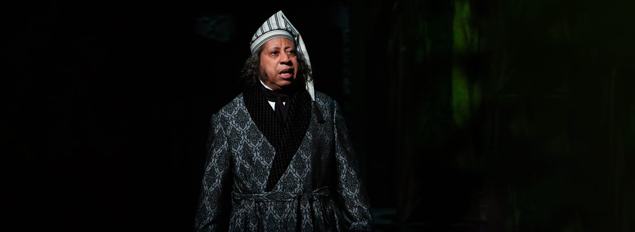 Photo of David Rainey as Ebenezer Scrooge